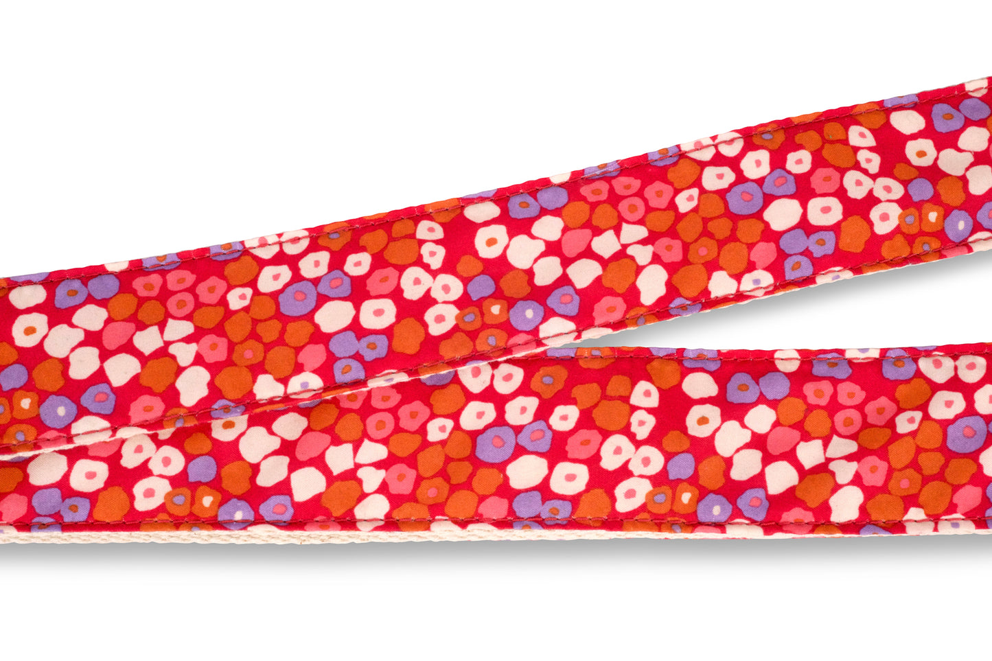 Vintage hot pink guitar strap with a floral polka dot design made by Original Fuzz in Nashville, TN.