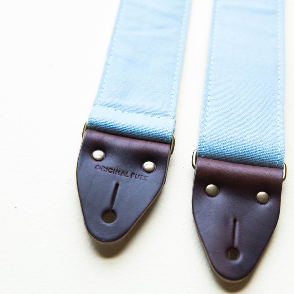 Light blue cotton canvas vintage-style guitar strap made by Original Fuzz in Nashville, TN.