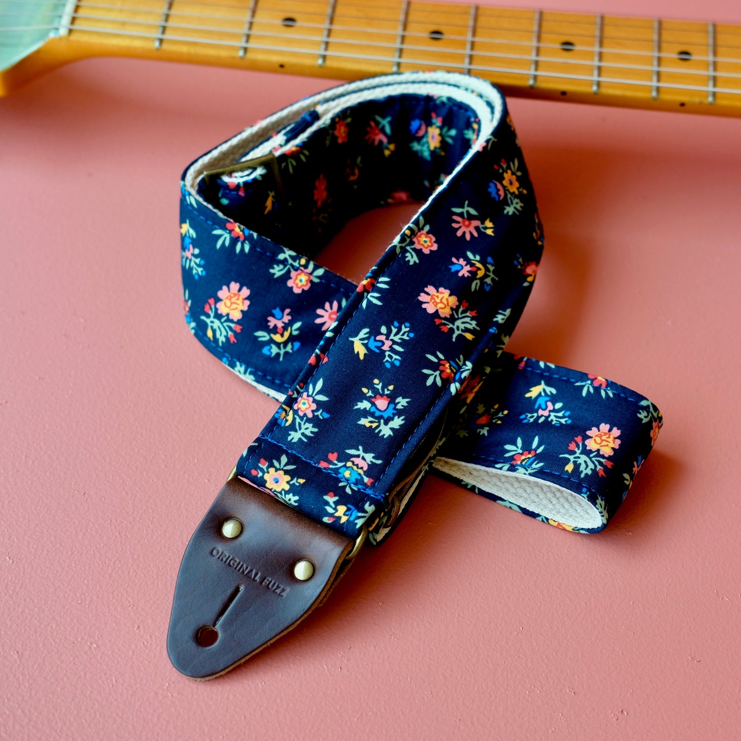 Classic navy floral handmade guitar strap by Original Fuzz in Nashville, TN.
