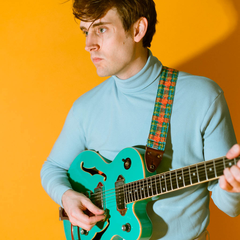 Vintage 70s plaid polyester guitar strap made with repurposed fabric by Original Fuzz.