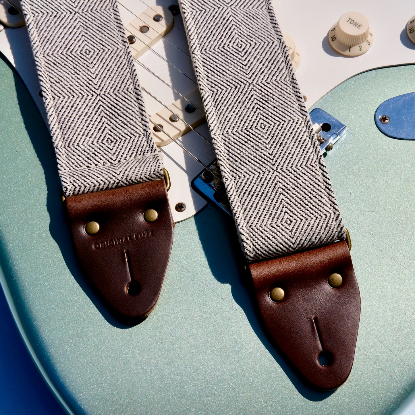Woven black and cream guitar strap made with imported fair-trade fabric from Indian in Nashville by Original Fuzz.
