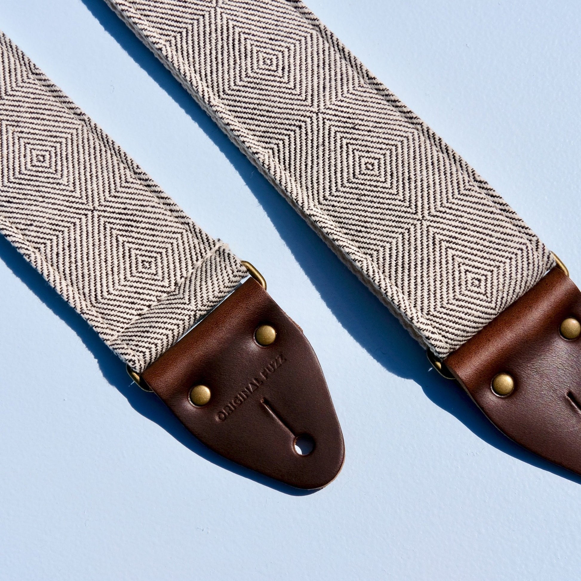 Woven black and cream guitar strap made with imported fair-trade fabric from Indian in Nashville by Original Fuzz.