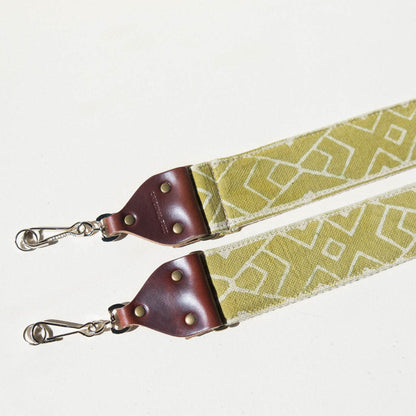 Vintage-style camera strap by Original Fuzz made with Indian block-printed cotton fabric in green with a traditional cream margosa design.