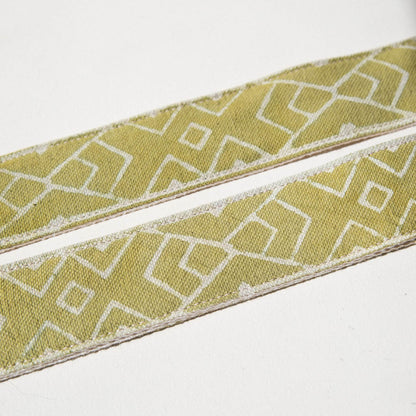 Block-printed Indian fabric in green with a traditional cream design vintage-style camera strap by Original Fuzz.
