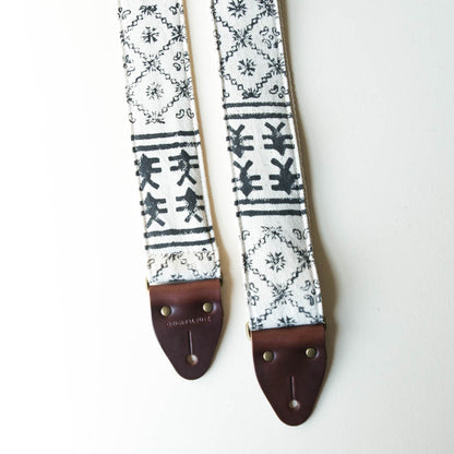 Vintage-style guitar strap made with black ink block-printed on white cotton fabric from India by Original Fuzz.