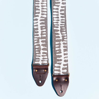 White and gray skeletal spine India block print vintage-style guitar strap by Original Fuzz. 