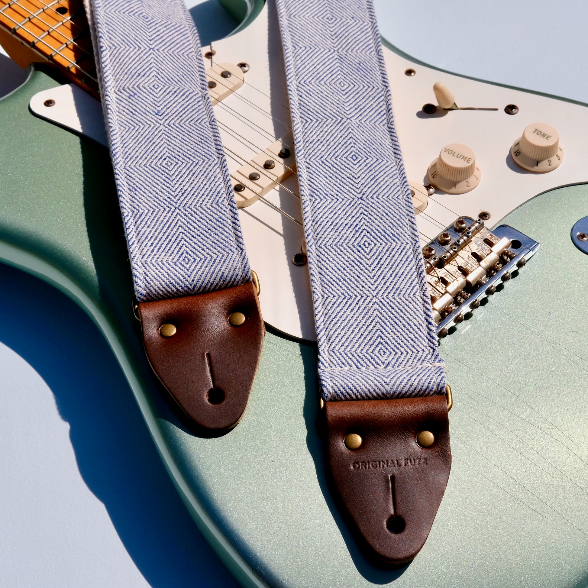 Blue and cream woven guitar strap made in Nashville using fair-trade fabric imported from India.