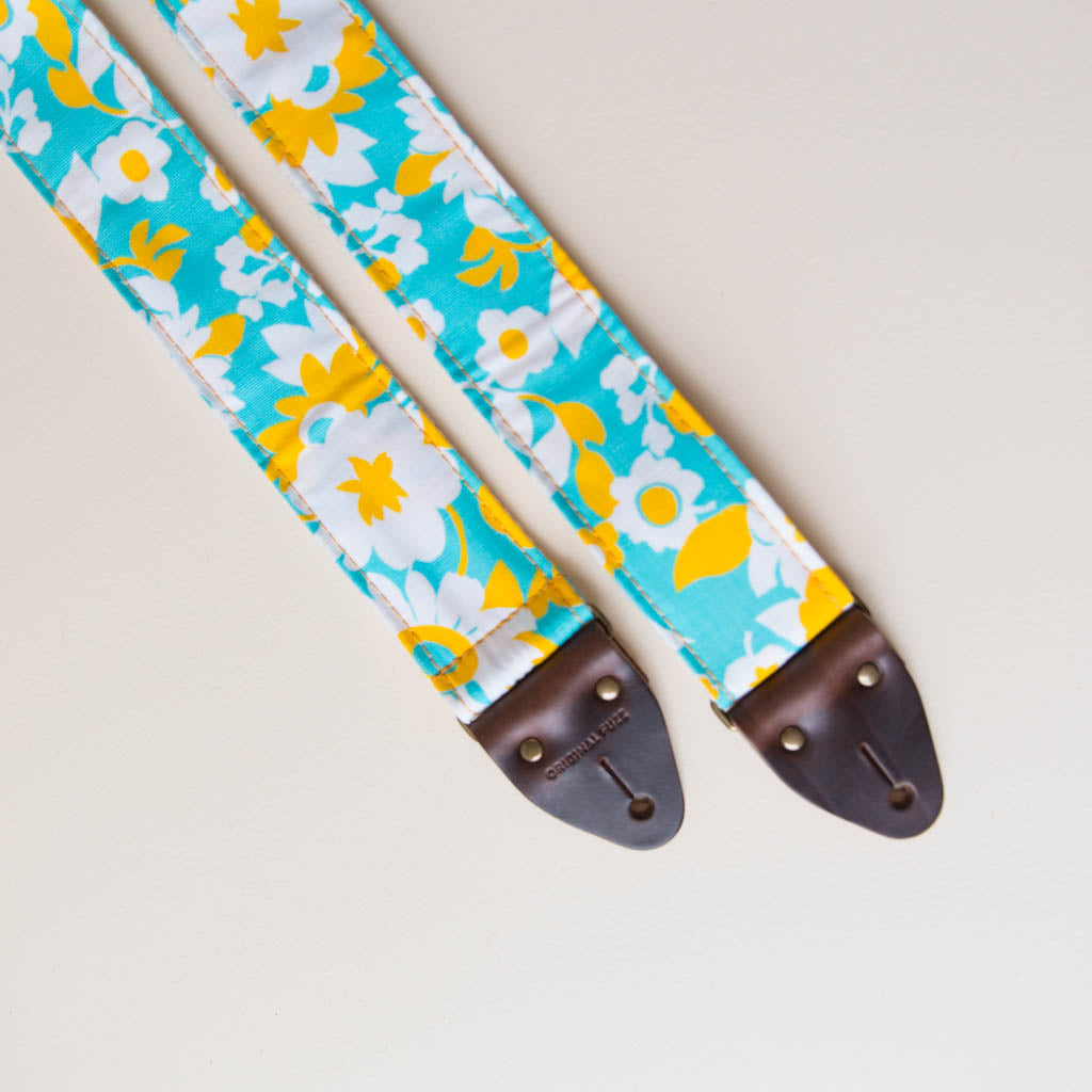 Vintage-style guitar strap made with repurposed light blue and yellow floral cotton by Original Fuzz.