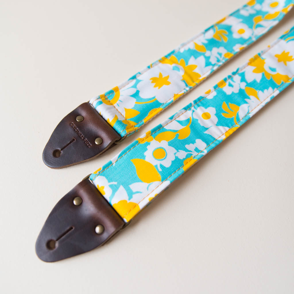 Vintage-style guitar strap made with repurposed light blue and yellow floral cotton by Original Fuzz.