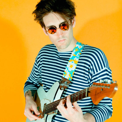 Vintage-style guitar strap made with repurposed light blue and yellow floral cotton by Original Fuzz.