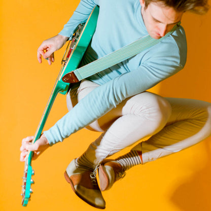 Vintage guitar strap made with 70s blue and yellow striped polyester by Original Fuzz.