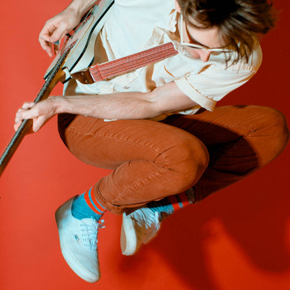 Vintage-style guitar strap made with repurposed vintage red cotton fabric by Original Fuzz.