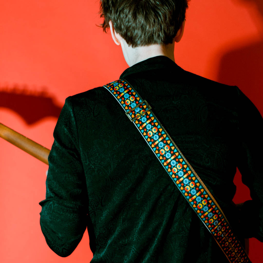 Vintage-style guitar strap made with a 60s style colorful woven jacquard by Original Fuzz.