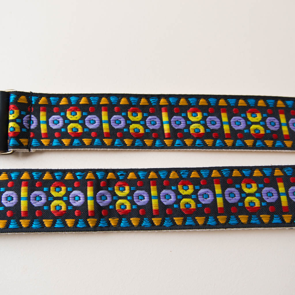 Vintage-style guitar strap made with a 60s style colorful woven jacquard by Original Fuzz.