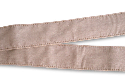 Fabric detail of Nashville guitar strap in woven cream fabric that we call the "Hillsboro Village"