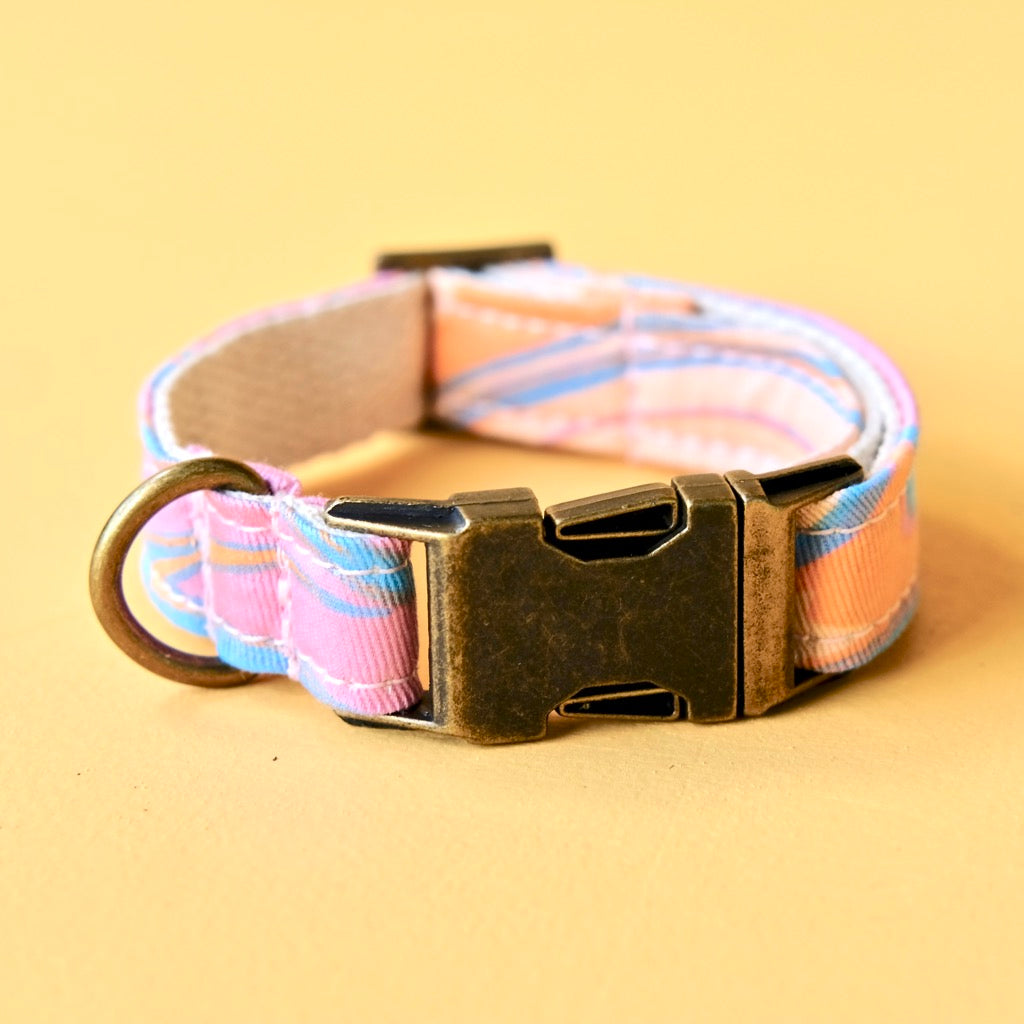 Psychedelic cotton print dog collar in pink and blue swirl made by Original Fuzz in Nashville.