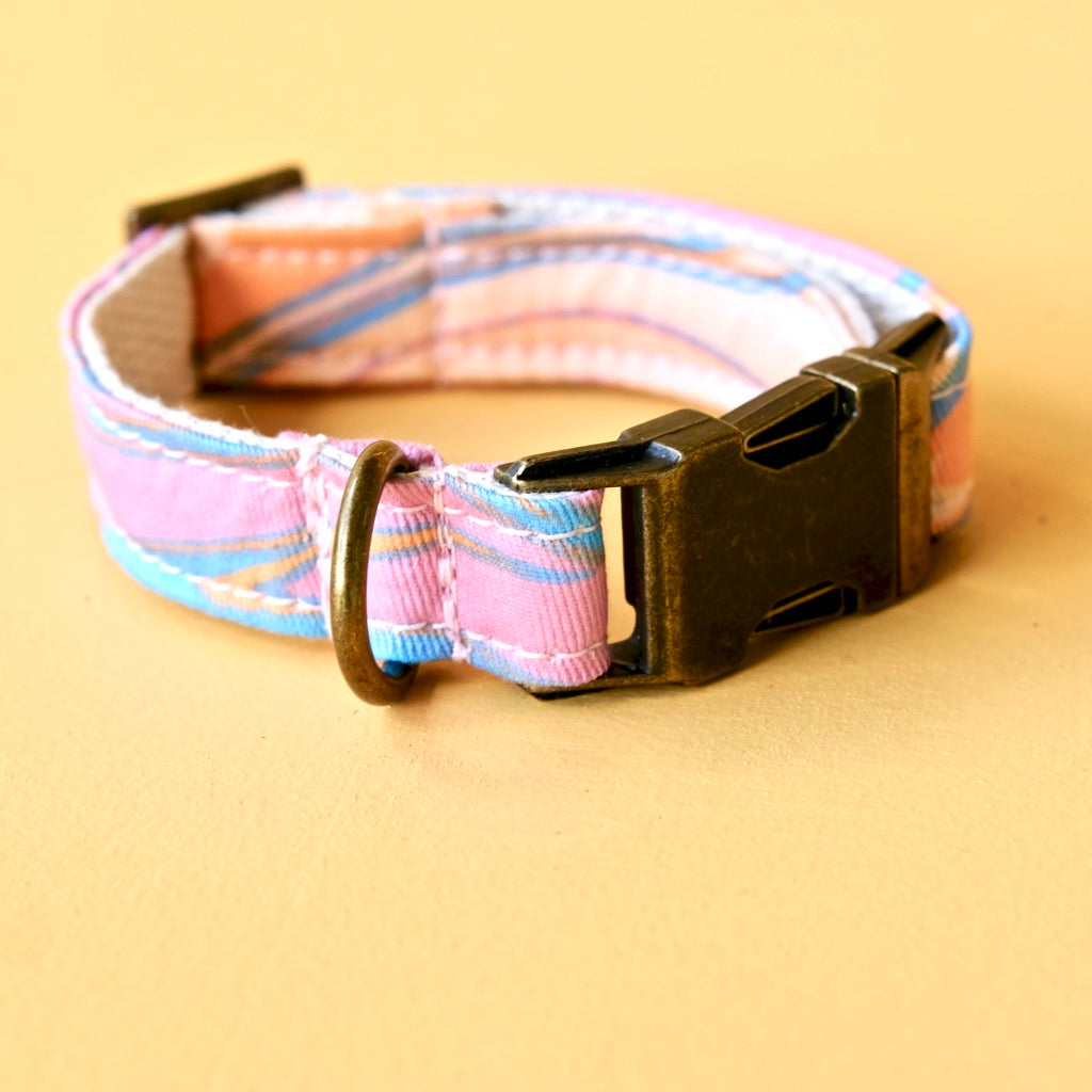 Psychedelic cotton print dog collar in pink and blue swirl made by Original Fuzz in Nashville.