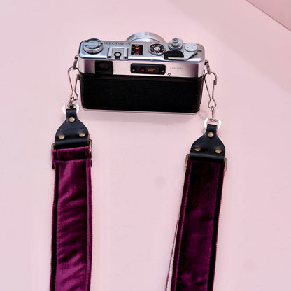 Original Fuzz purple velvet camera strap in the new skinny width with vintage camera.