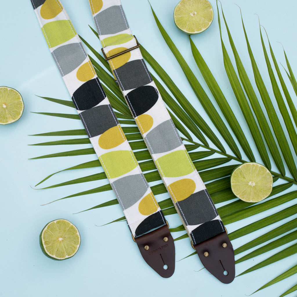 Vintage guitar strap with a retro lime green and black circle design made by Original Fuzz in Nashville, TN. 