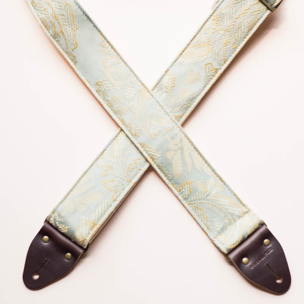 Light blue paisley embroidered vintage guitar strap by Original Fuzz. 