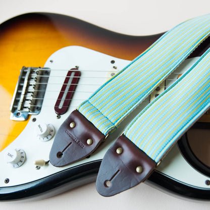 Vintage guitar strap made with 70s blue and yellow striped polyester by Original Fuzz.