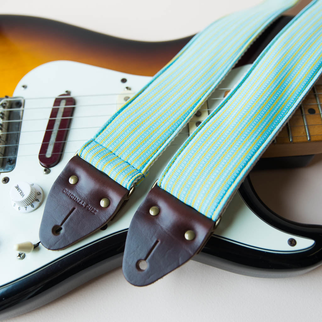 Vintage guitar strap made with 70s blue and yellow striped polyester by Original Fuzz.