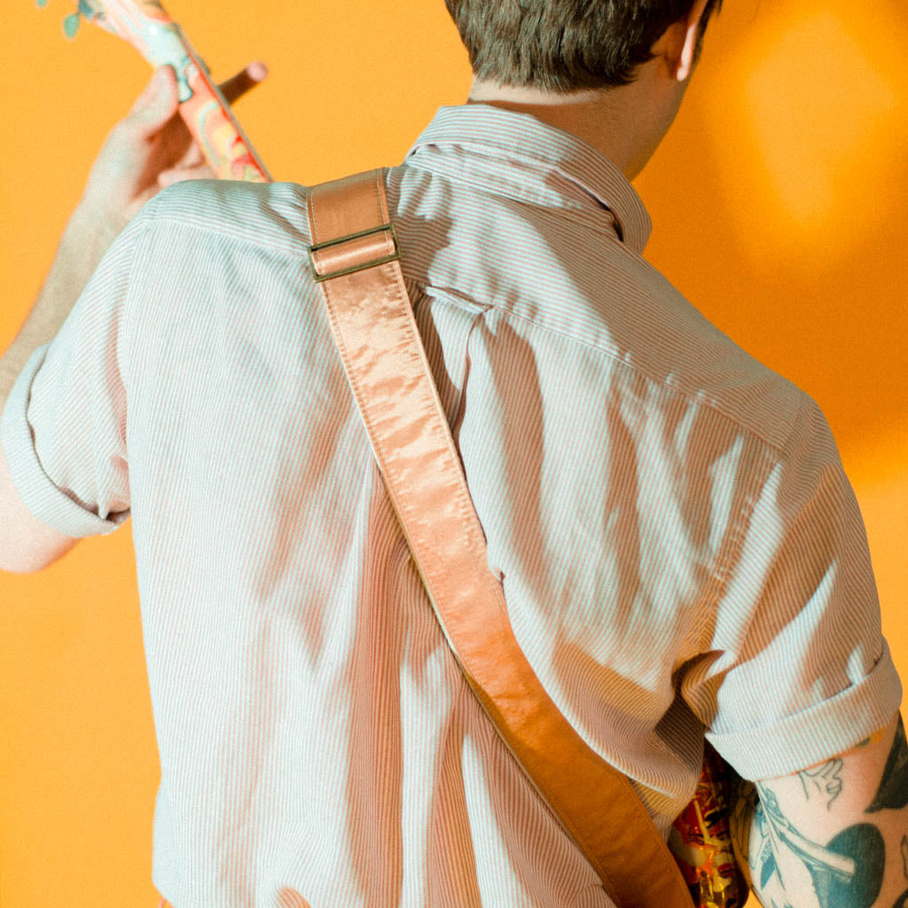 Gold satin vintage guitar strap made by Original Fuzz. 