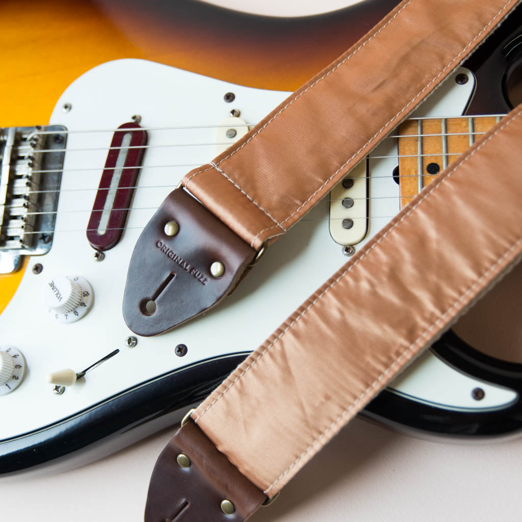 Gold satin vintage guitar strap made by Original Fuzz. 