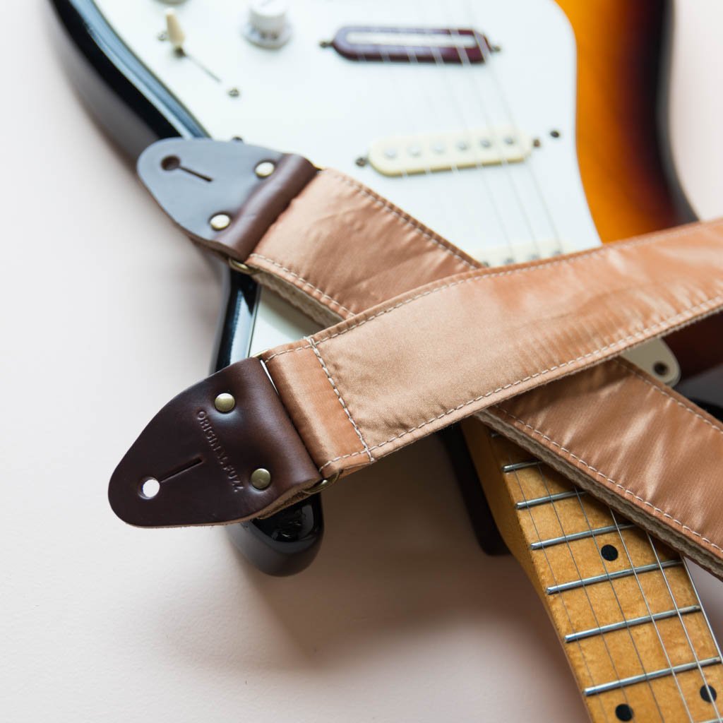 Gold satin vintage guitar strap made by Original Fuzz. 