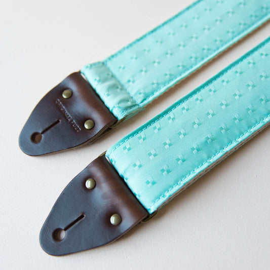 Vintage guitar strap made with light blue satin by Original Fuzz. 