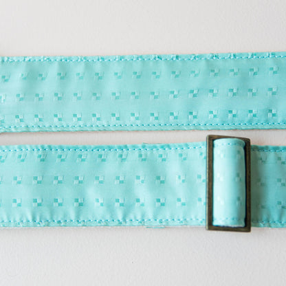 Vintage guitar strap made with light blue satin by Original Fuzz. 