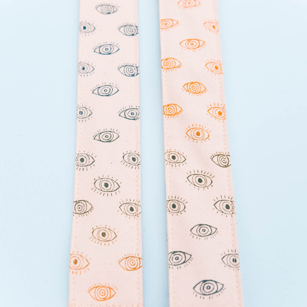 third eye eyeball silkscreen guitar strap by original fuzz and grand palace