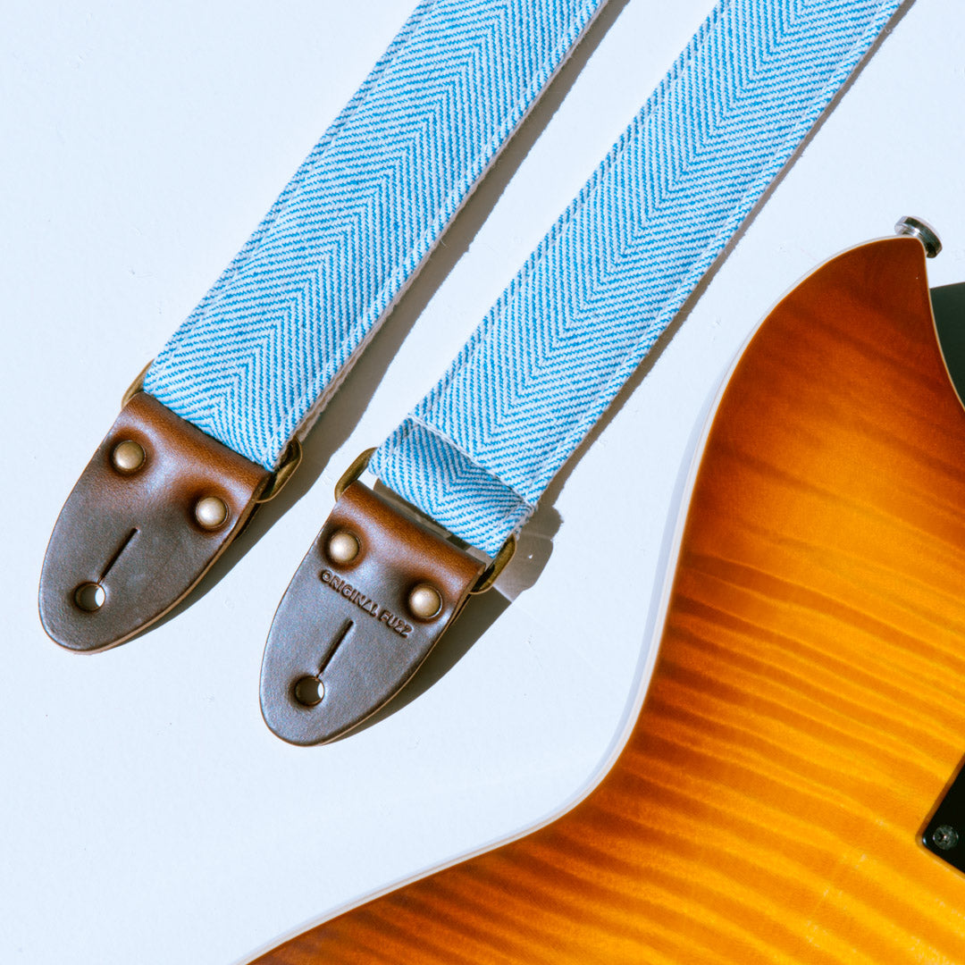 Light blue and cream woven herringbone skinny guitar strap from India collection by Original Fuzz
