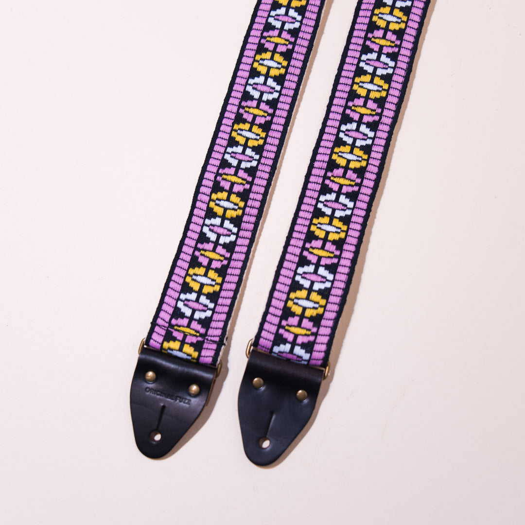 Detail of the vintage guitar strap in everett street