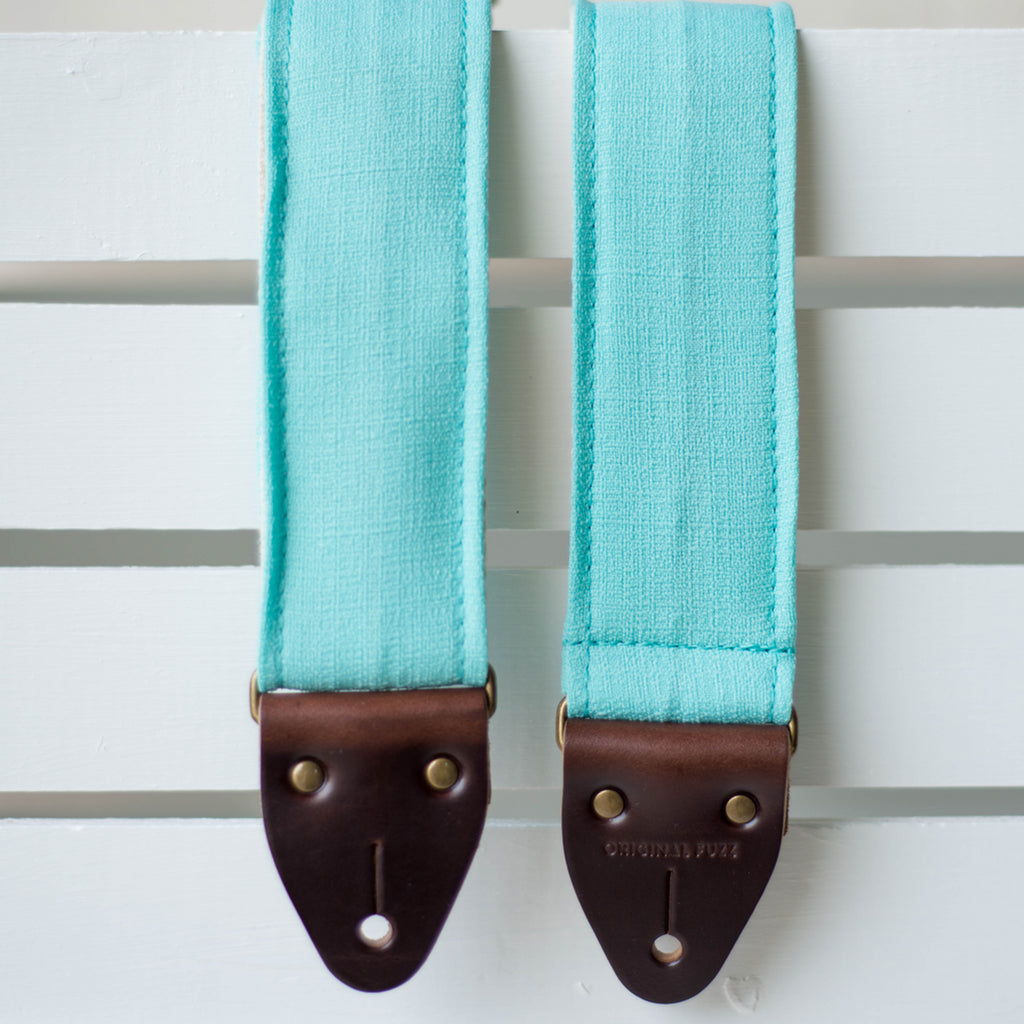 Vintage surf green polyester guitar strap made by Original Fuzz in Nashville, TN. 