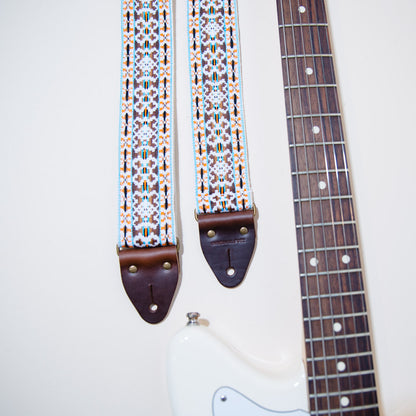 Another view of the vintage guitar strap in Merrimon Ave with a Fender Jaguar