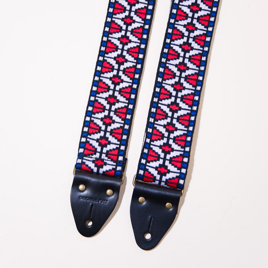 Close up of the vintage guitar strap in Patton Ave